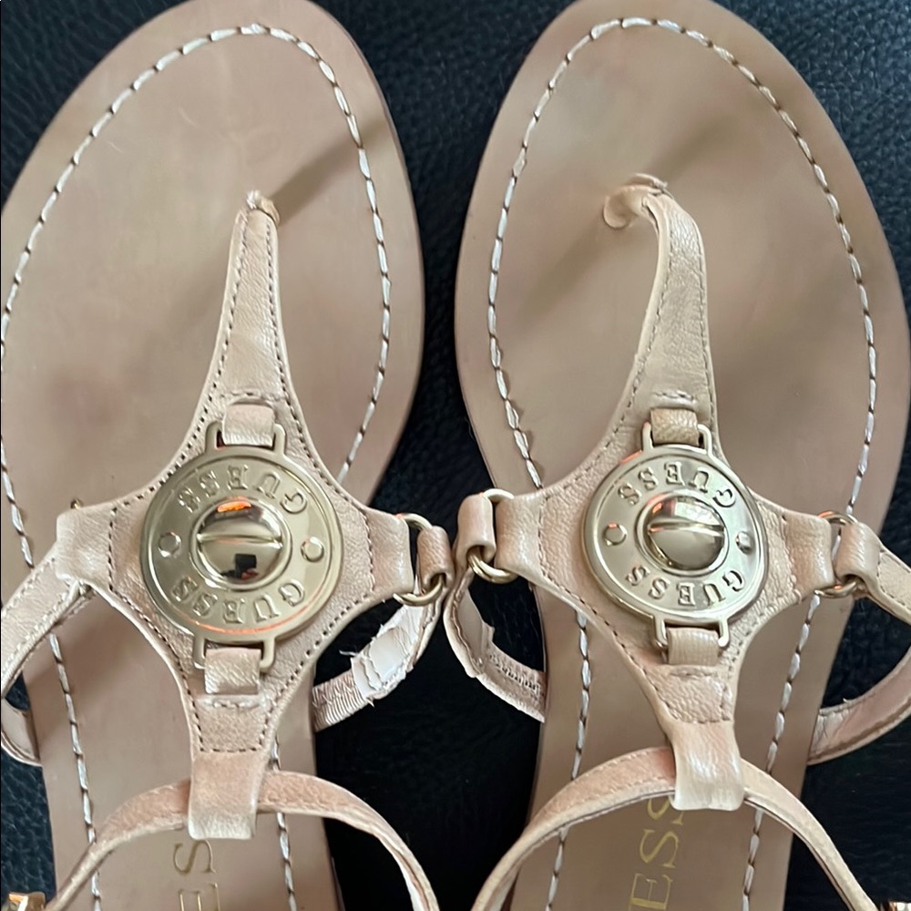 Cream T-Strap Sandals with Gold Medallion